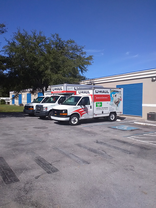 U-Haul rental truck parked in parking lot at storage facility.