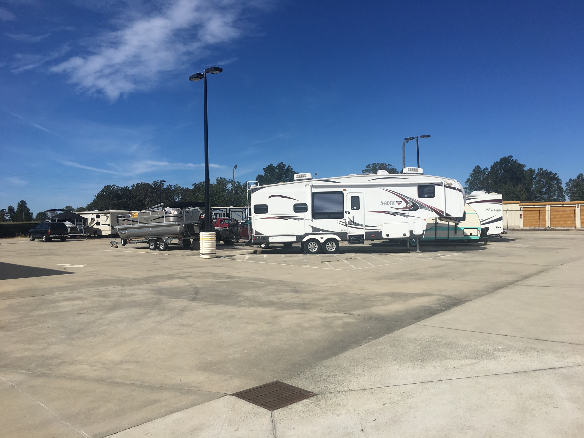 Boat and RV parking in Whitesett, NC at Compass Self Storage.