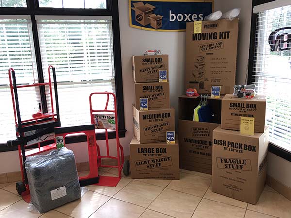 Moving boxes at Compass Self Storage.