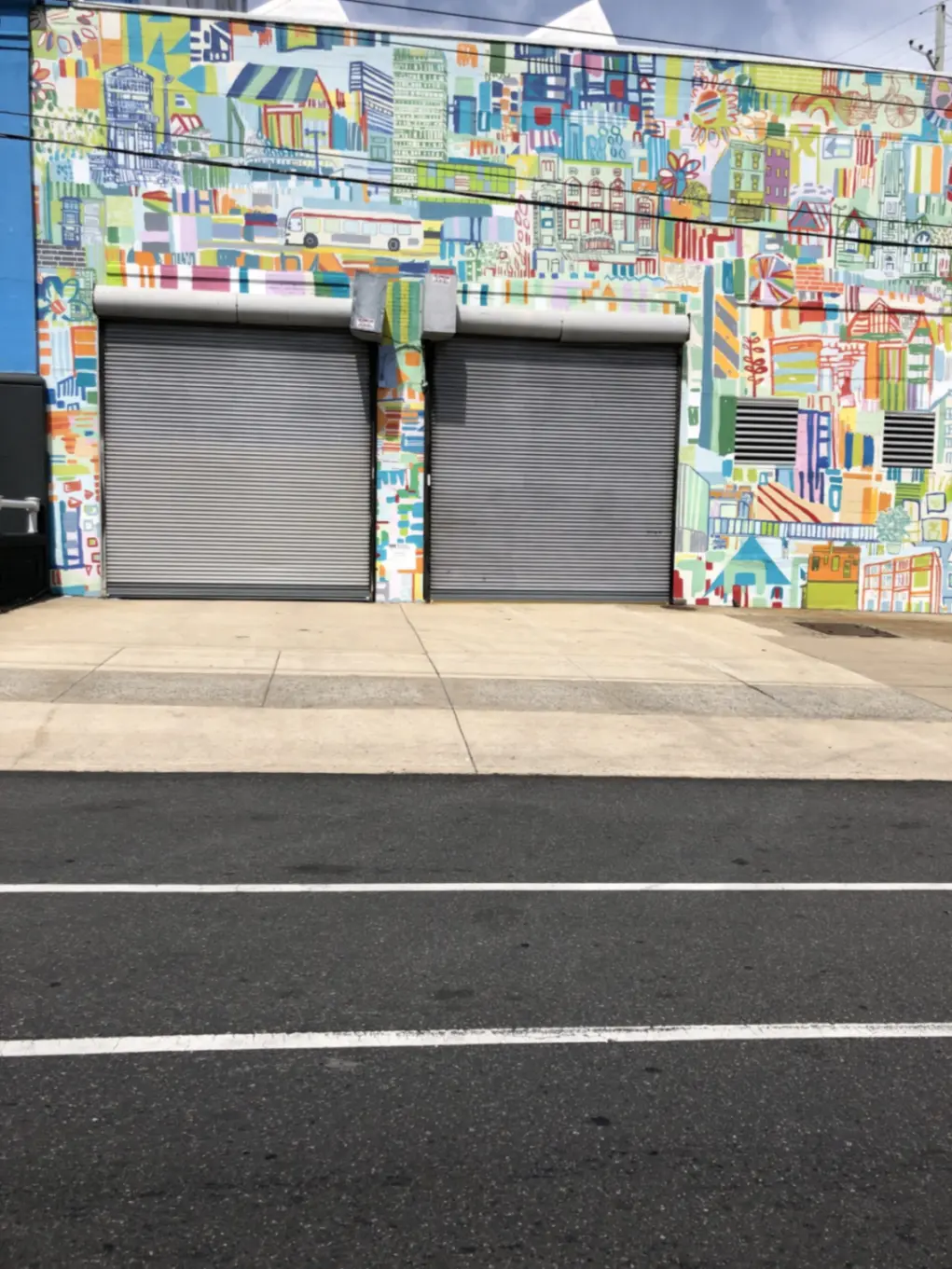 Unique painted drive-up storage units.