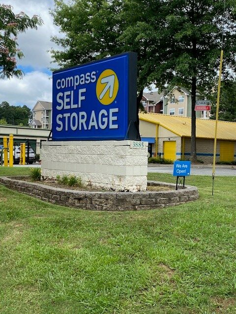 Compass Self Storage sign.