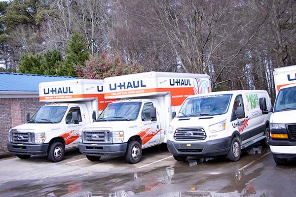 Moving trucks at Compass Self Storage.