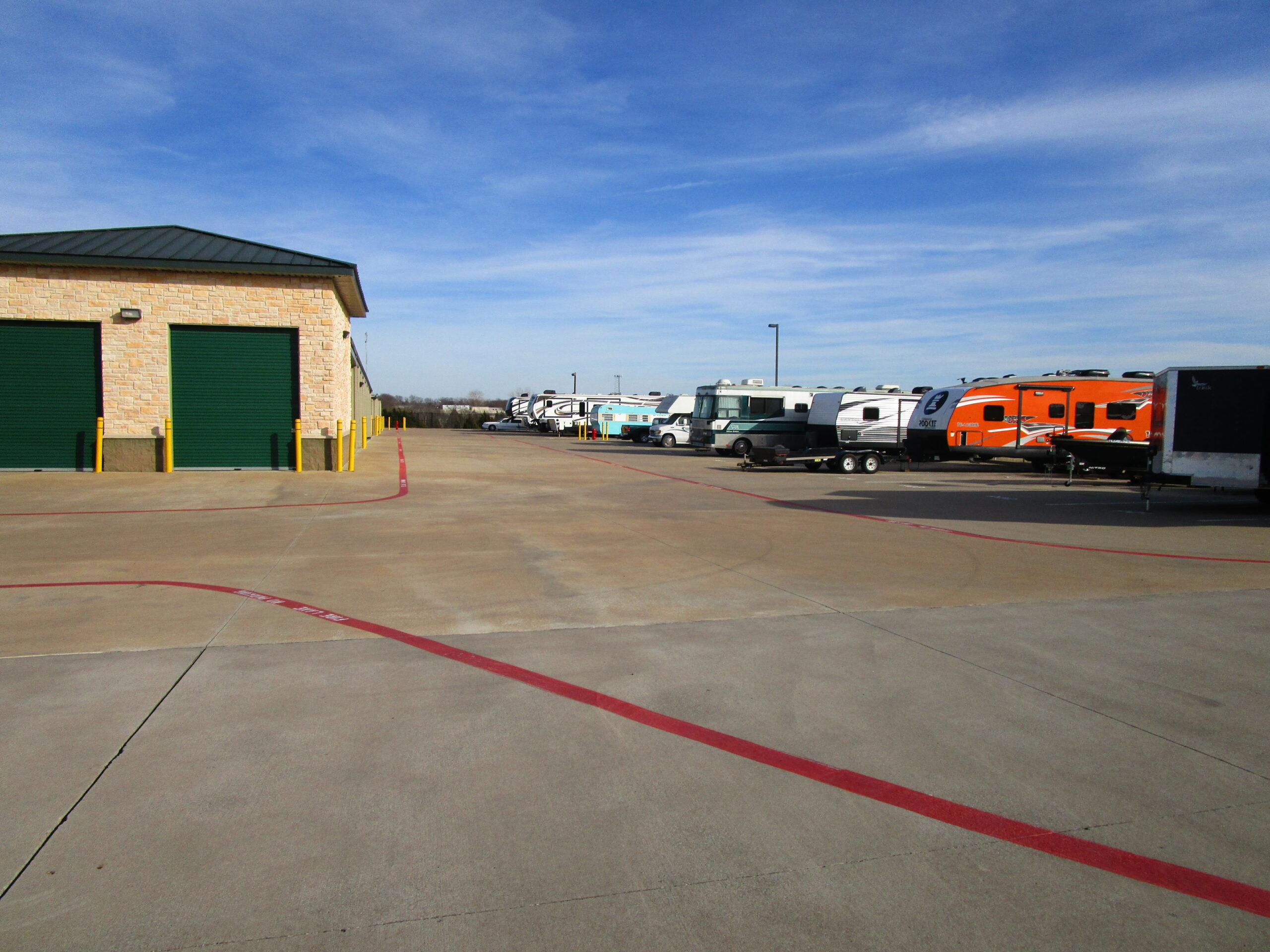 Outdoor RV parking at Compass Self Storage.