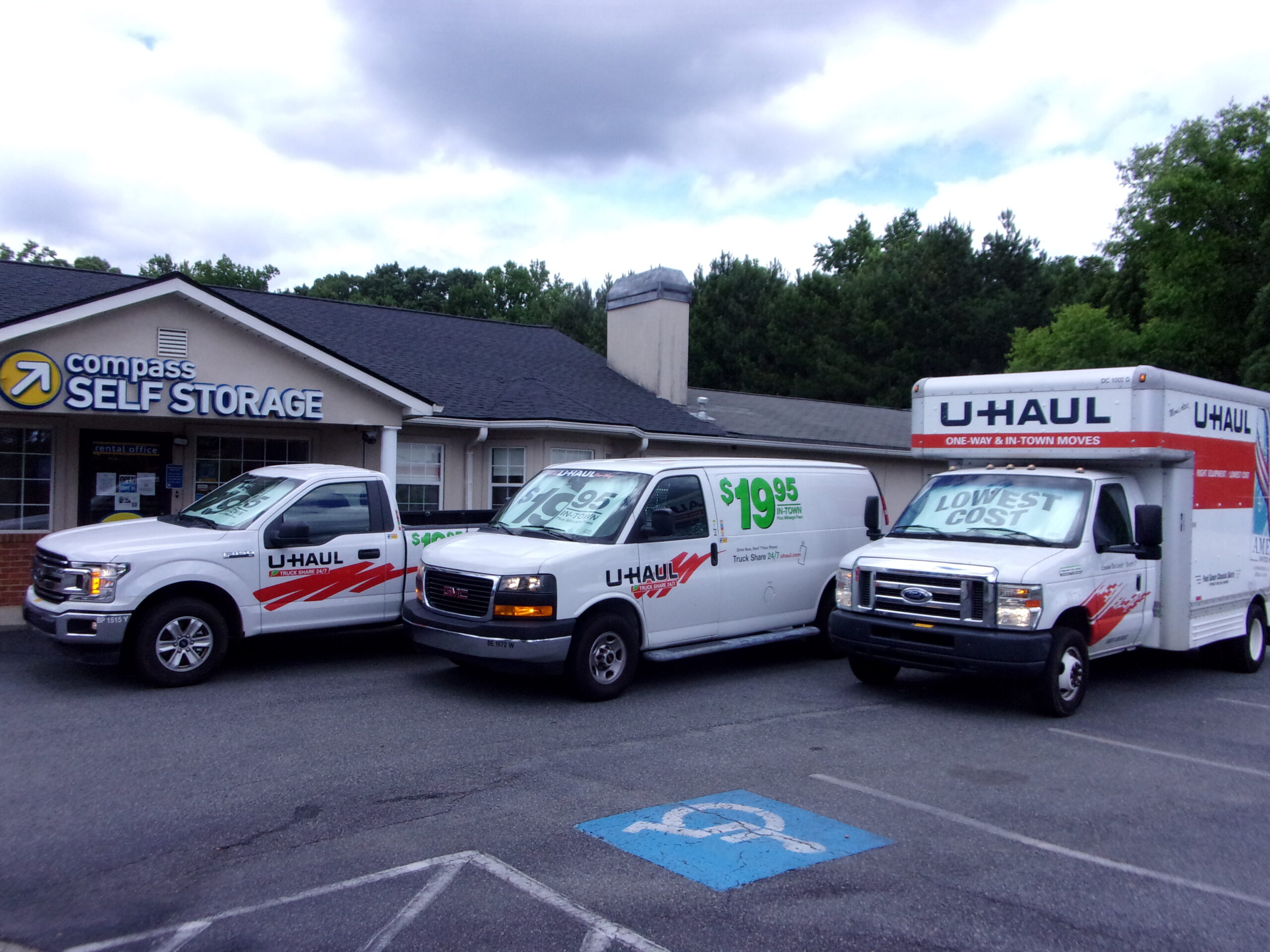 Moving trucks at Compass Self Storage.