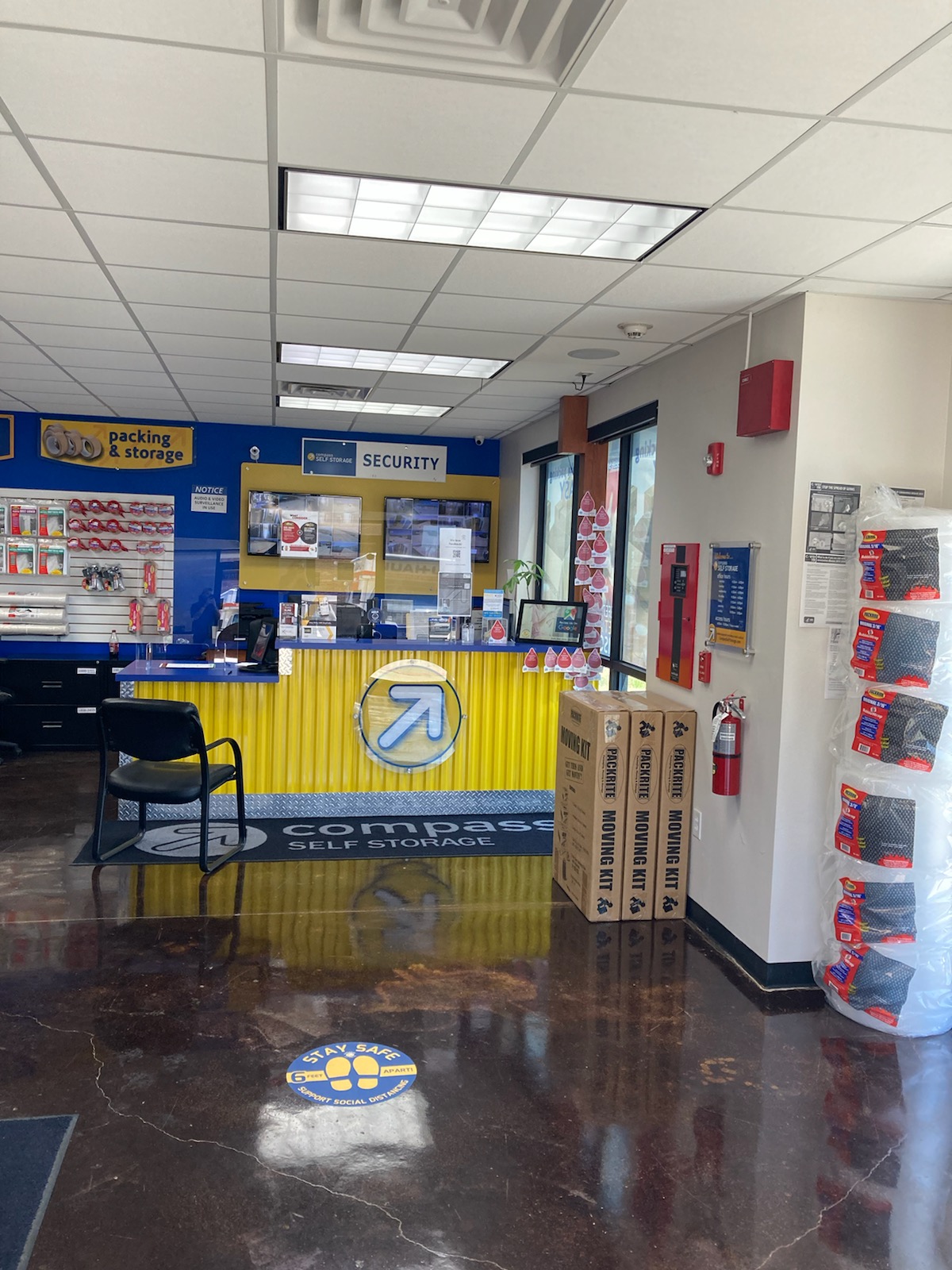 Security desk with surveillance cameras at Compass Self Storage.