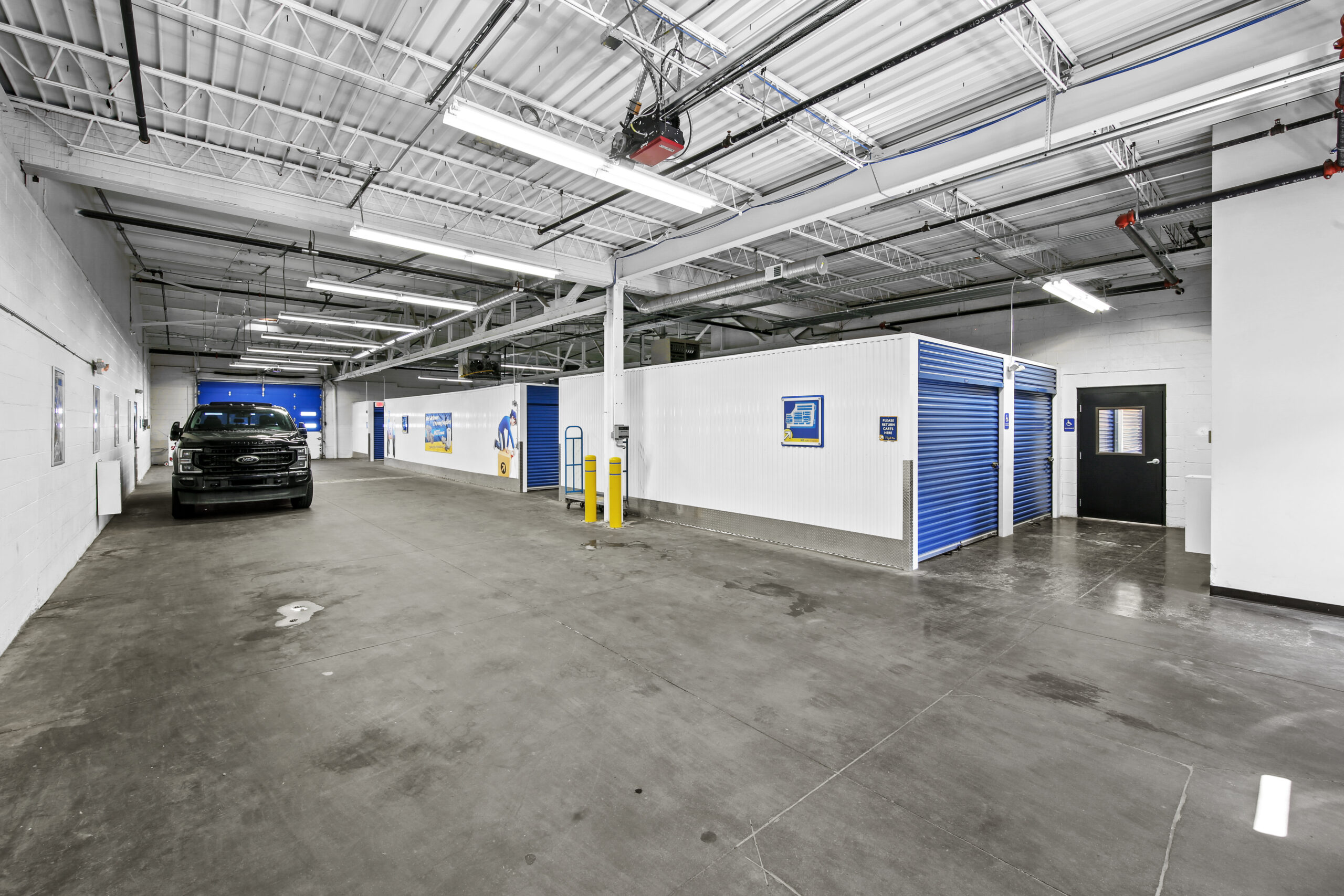 Indoor parking and storage units at Compass Self Storage.