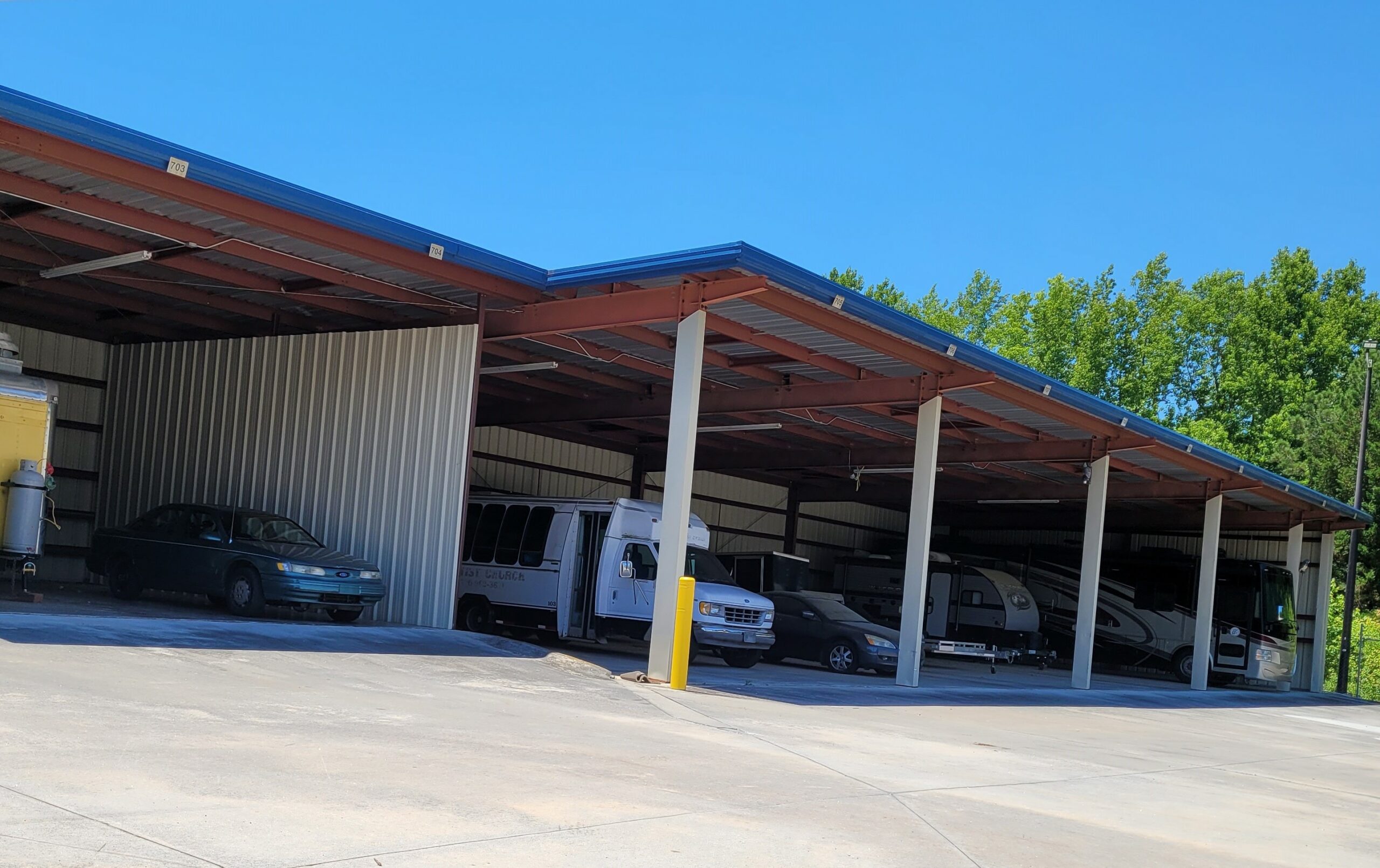 Covered RV parking at Compass Self Storage.