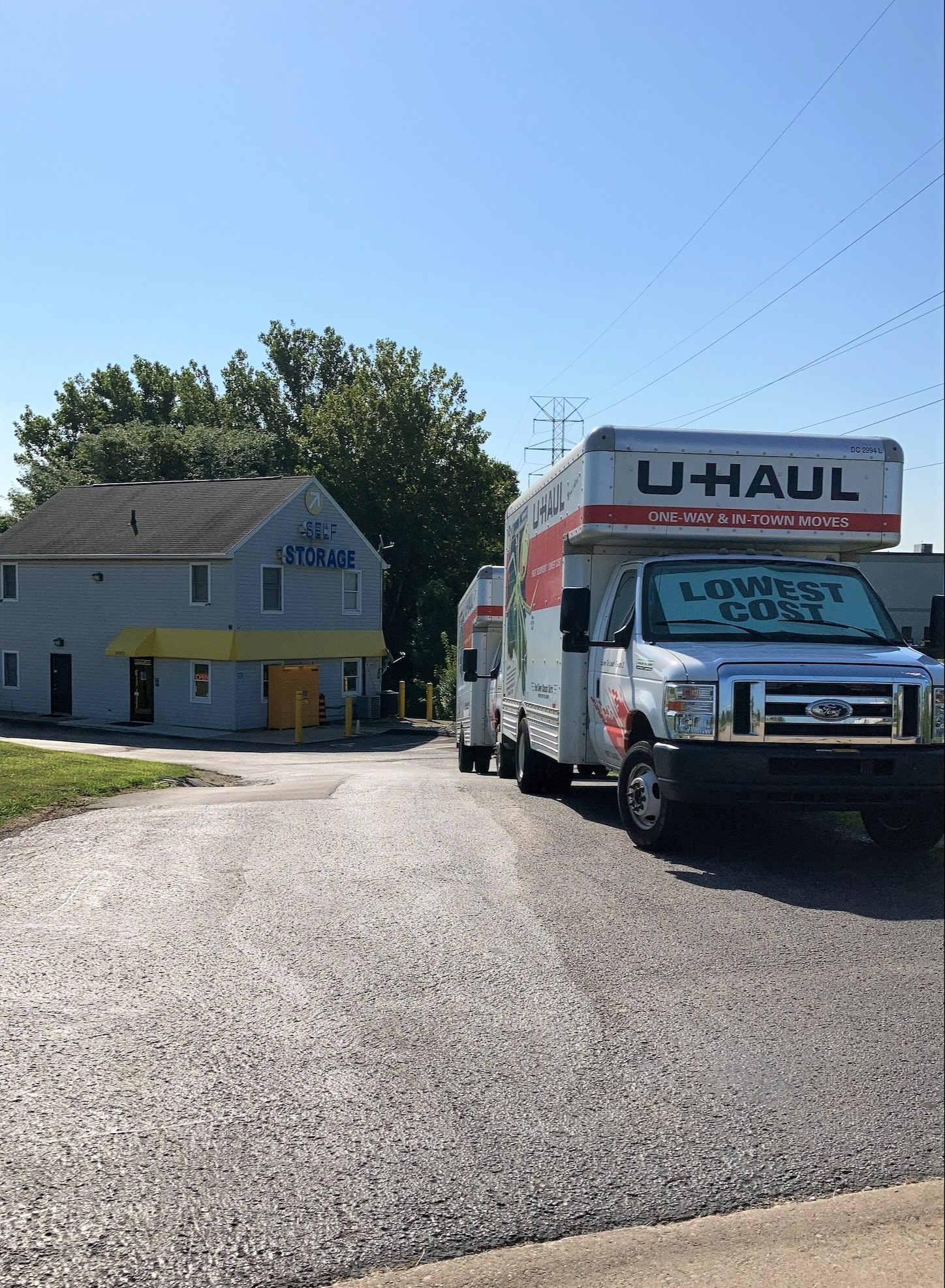 U-Haul moving truck parked in front of storage facility.