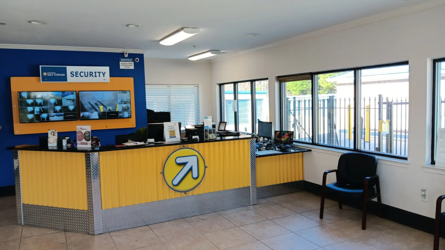 Compass Self Storage security desk with surveillance camera.