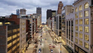 an above-street view into downtown Detroit at dusk