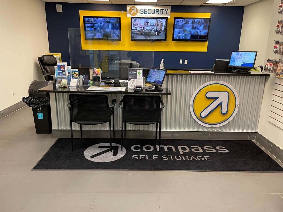Compass Self Storage security desk with surveillance camera system.