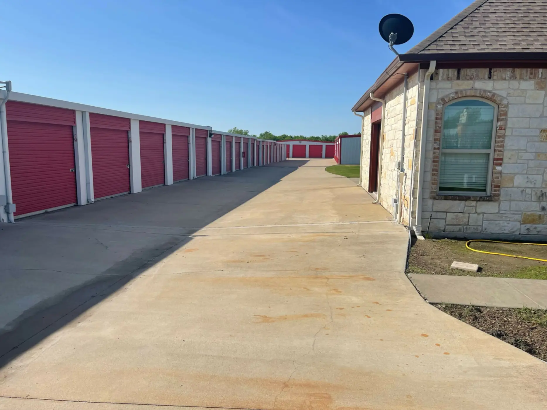 Paved drive-up storage units.