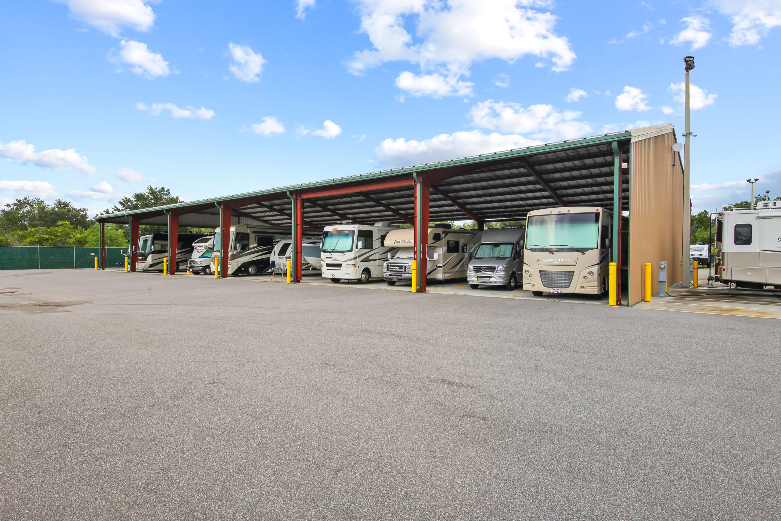 Outdoor covered RV parking.