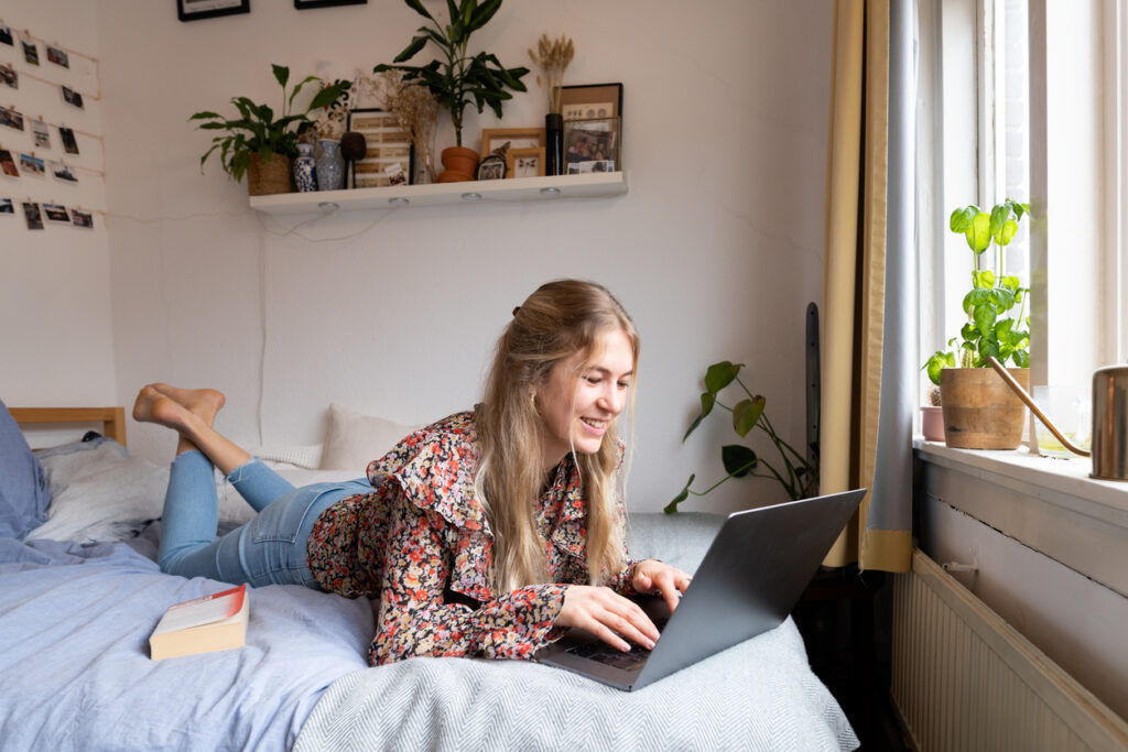 A university student in her own dorm room.