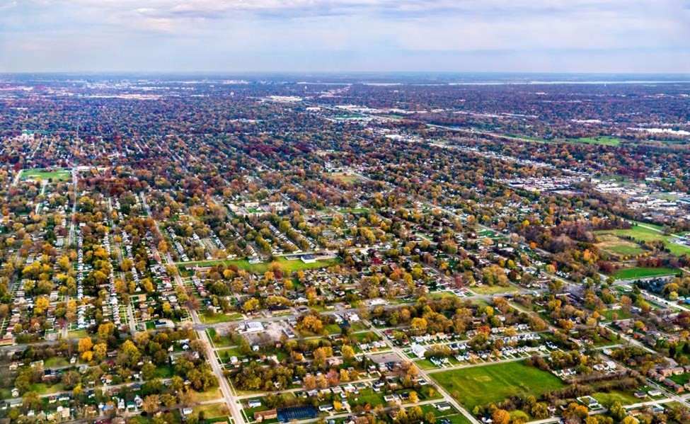 An aerial shot of Detroit suburbs in the fall