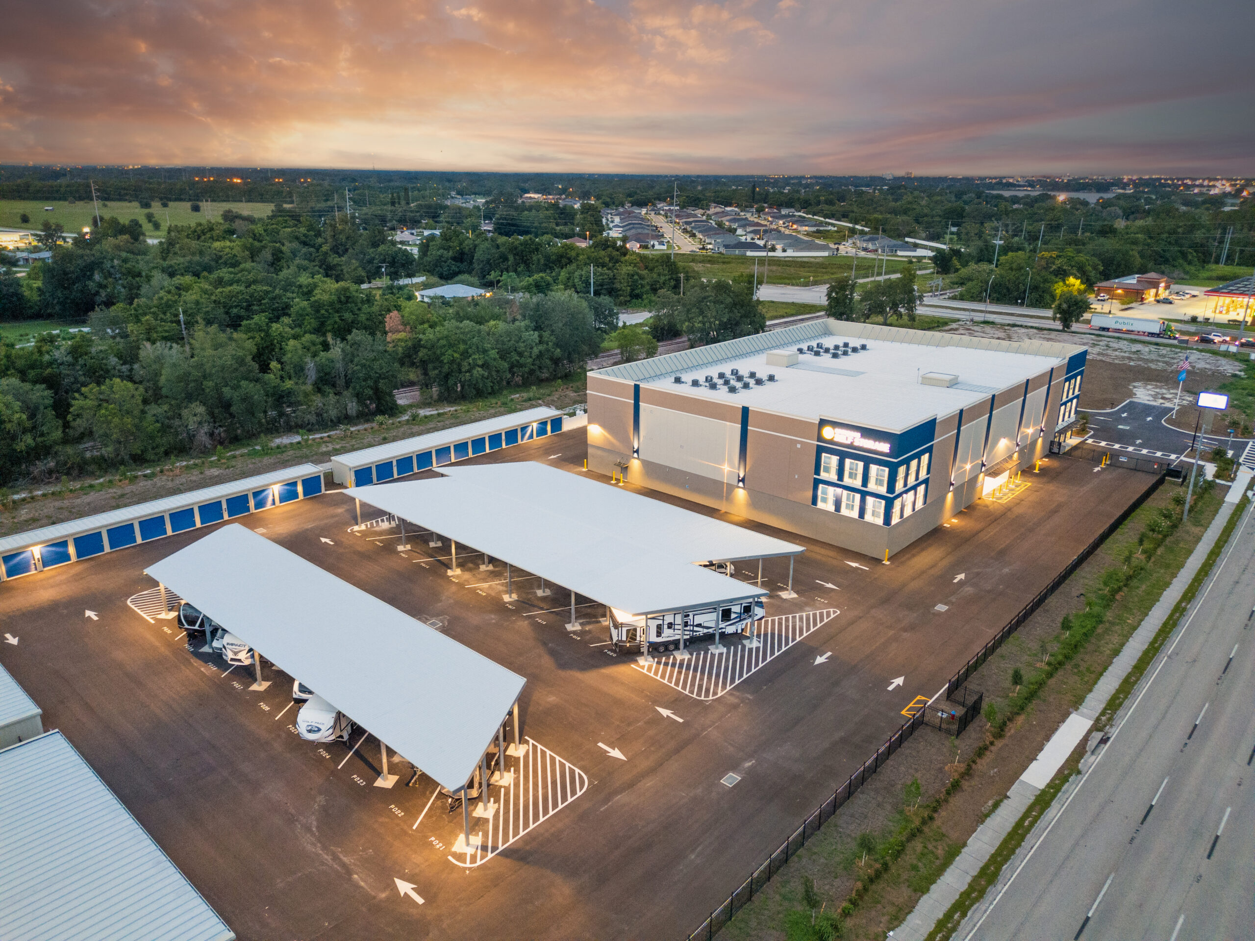 Aerial view of storage facility and surrounding area.