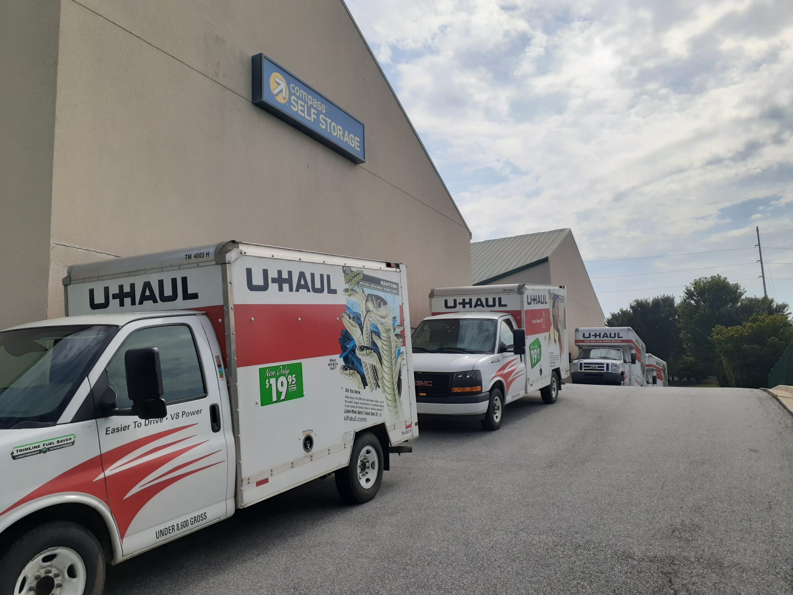 Moving trucks at Compass Self Storage.