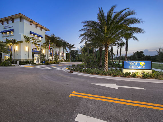 Facility signage at Compass Self Storage.